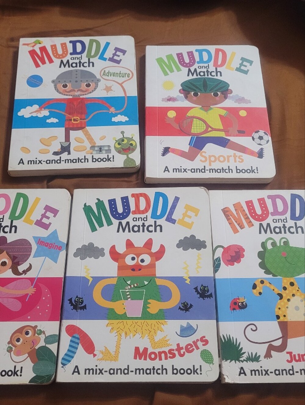 Usborne Muddle and Match Kids Mix-and-Match Board Book - Colorful Characters
